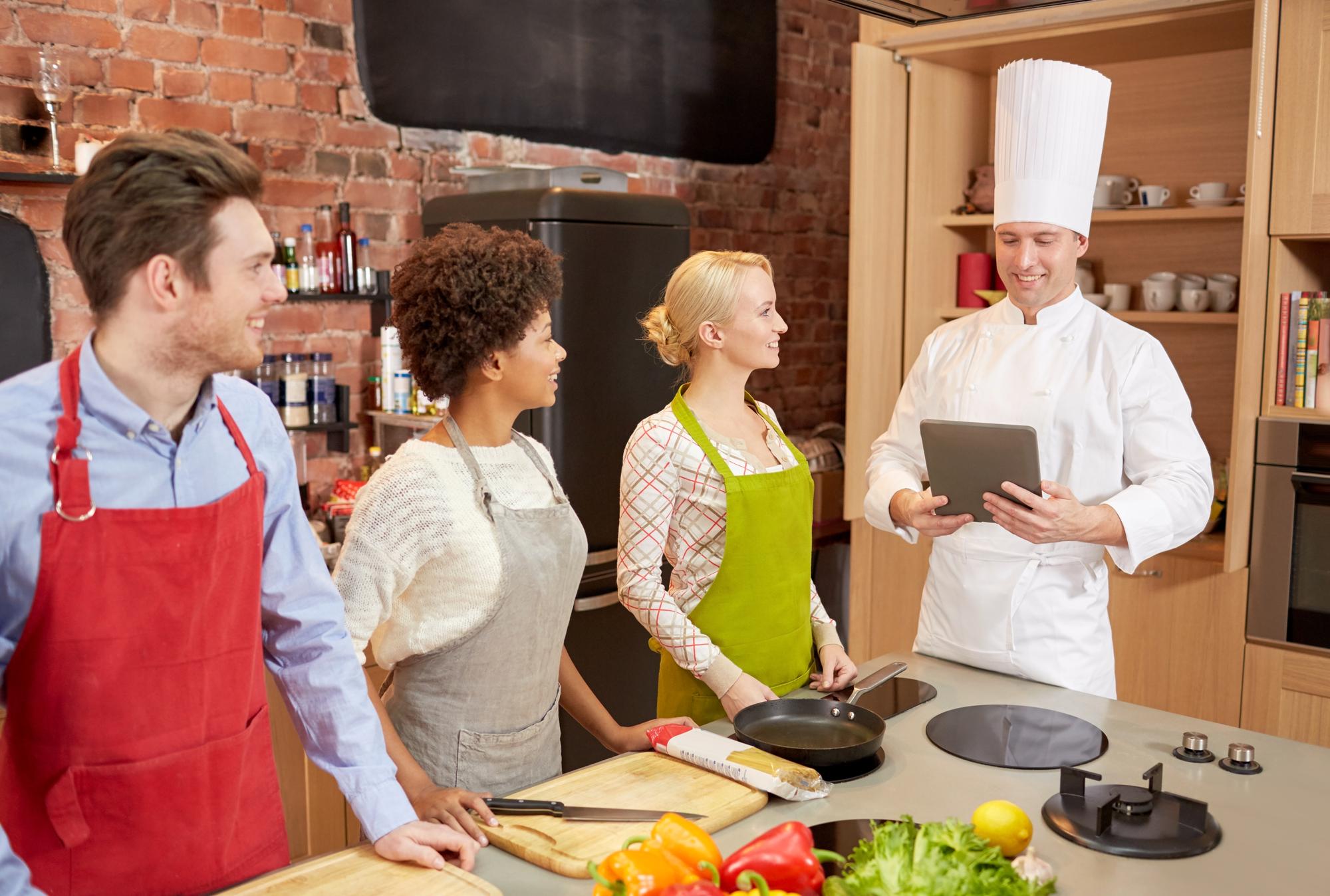 Classroom kitchen with chef and students